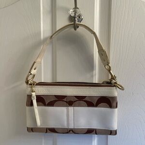 White coach, genuine leather handbag.
